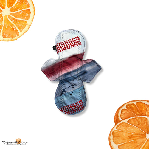 8 Inch Reusable Cotton Pad: Bamboo Core, Water-Resistant Fleece, Sunset Print