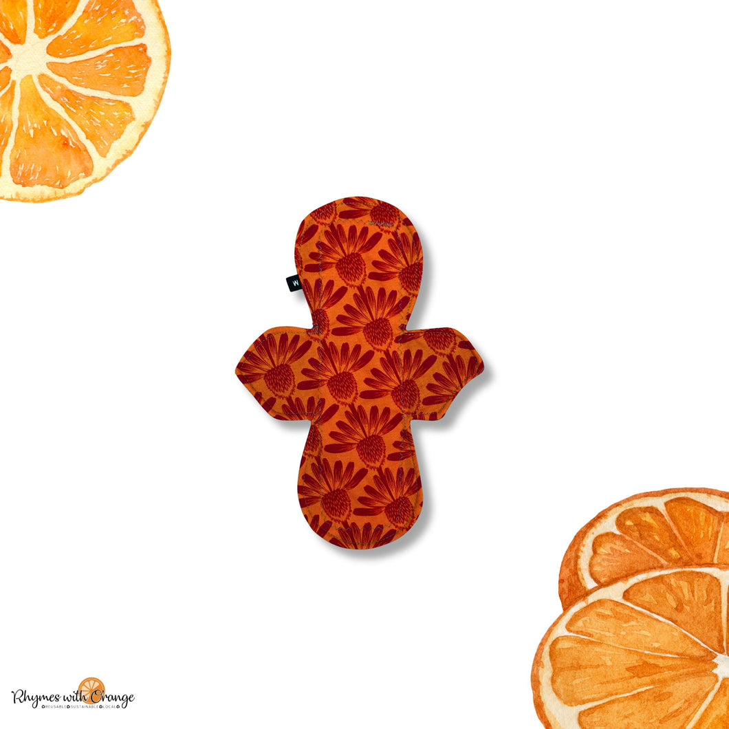 Moderate Reusable cloth Pads with, Cotton Topper, and Water-Resistant - Comfortable and Sustainable Sanitary Napkins, orange cone flower